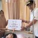 Pj Wali Kota Lhokseumawe Serahkan Dana Pengobatan untuk Remaja Penderita Tumor