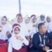 Murid SD Yapena Arun Nobar Langsung Cabor Aerosport Terbang Layang di Venue Bandara Malikussaleh