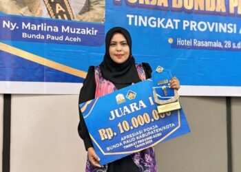 Ketua Pokja Bunda PAUD Kota Lhokseumawe, Nofayana, ST, M.AP, usai meraih Juara I pada Ajang Apresiasi Bunda PAUD Tingkat Provinsi Aceh 2025 di Banda Aceh.