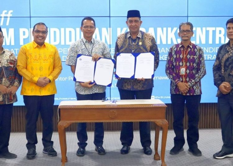 Penandatanganan Perjanjian Kerja Sama (PKS) antara BI Lhokseumawe dengan lima perguruan tinggi mitra di Ruang Theater Gedung TDC PNL